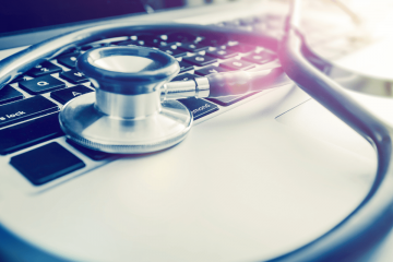 Stethoscope on laptop