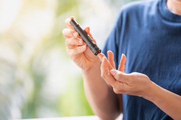 person checking blood sugar